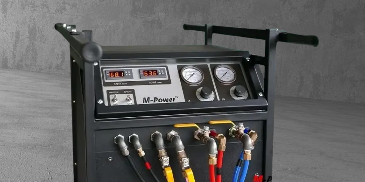 m-power spray foam machine closeup with a cement background